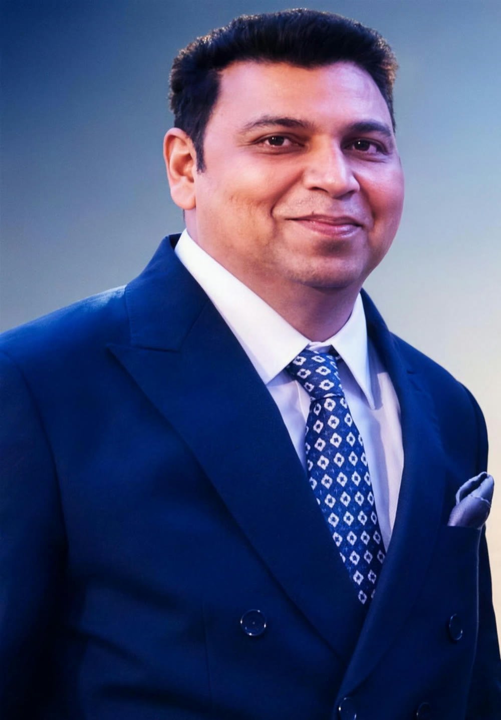 Ravi Nagpal, founder of Nagpal Properties, in a navy suit